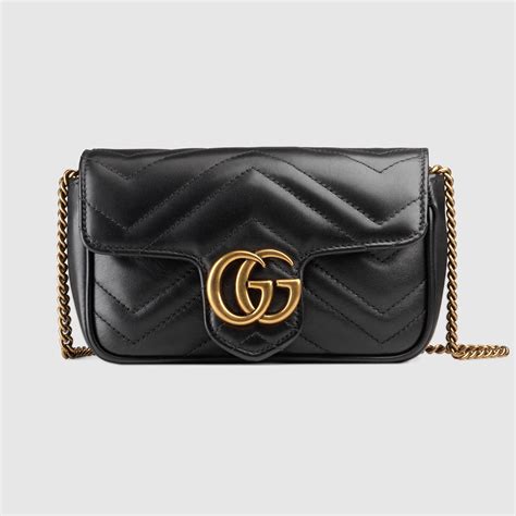 gucci borsa nera pelle cavallino|Super mini borsa GG Emblem in pelle nera .